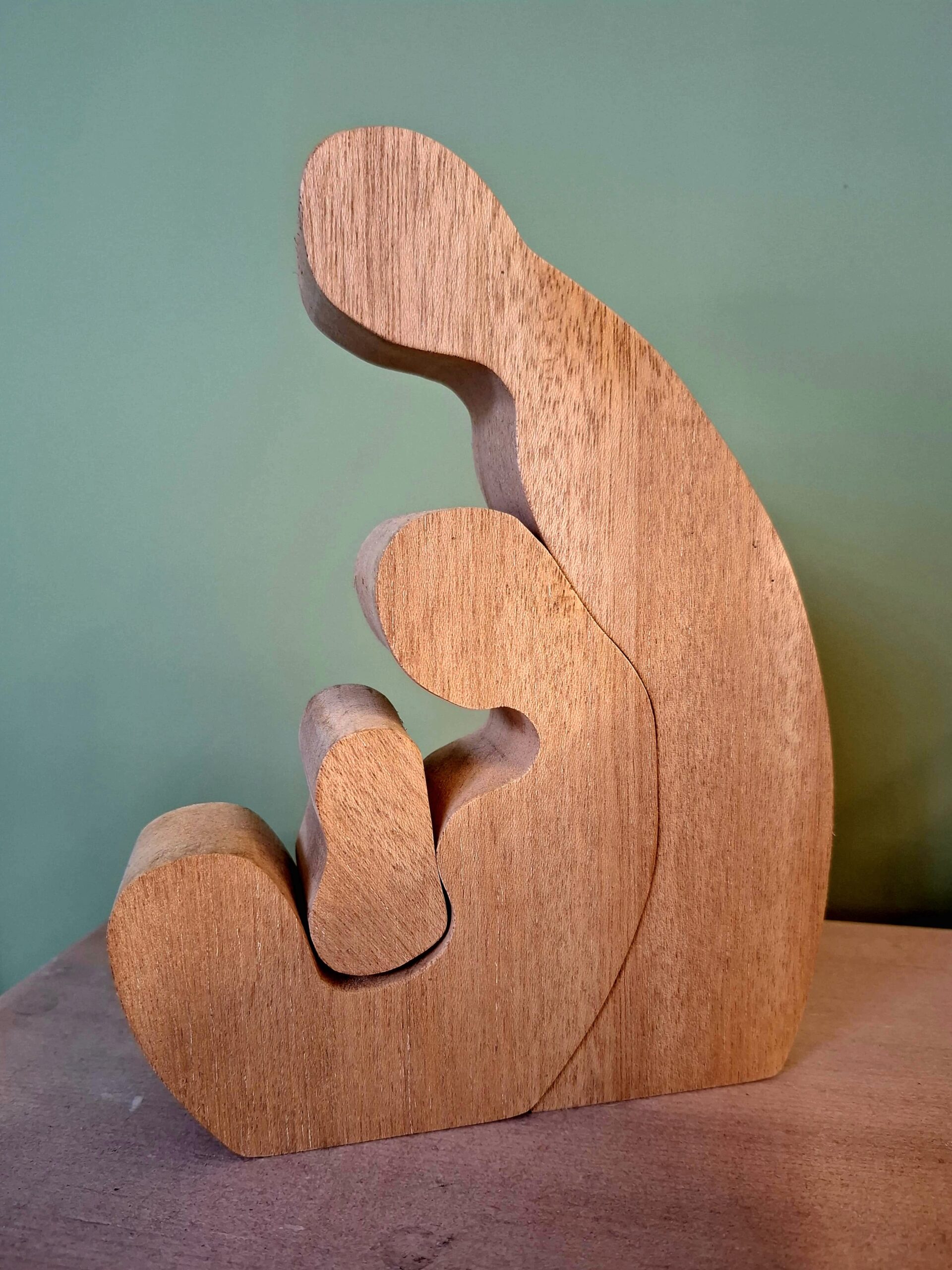 ZorgWonder.nl - houten beeldje - vader moeder baby